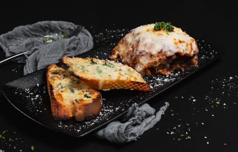 Coal roasted garlic bread with herbs