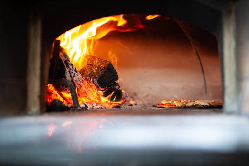 Fresh pizza ingredients and coal fired oven at Anthony's